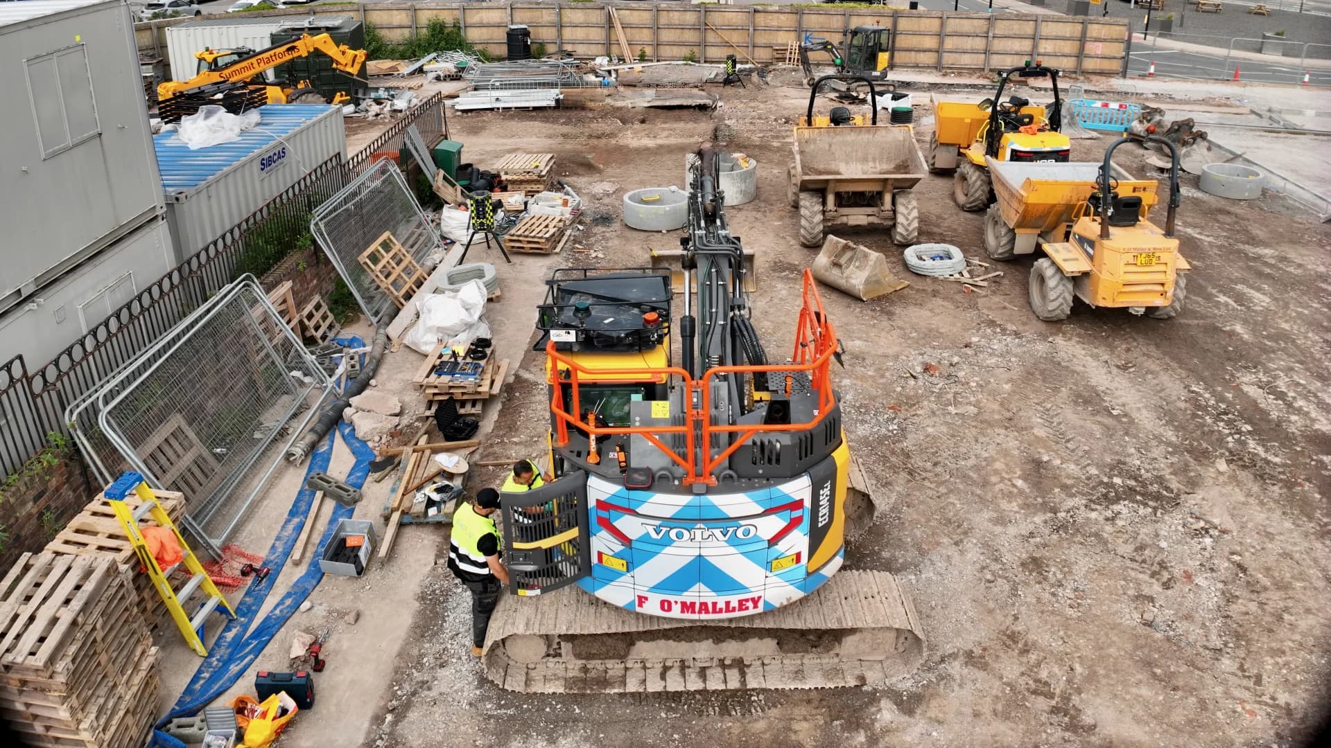 Construction site with surveying equipment
